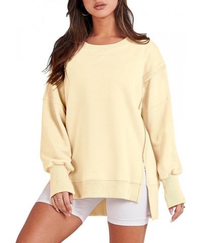 Women's Oversized Sweatshirt Crew Neck Long Sleeve Casual Slit Sloucthy Pullover Top Fall Clothes Cream Yellow $17.57 Hoodies...