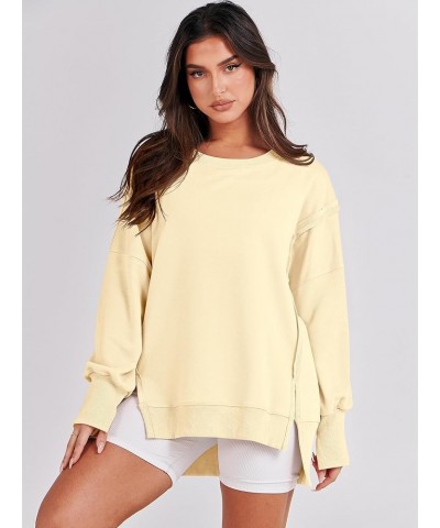 Women's Oversized Sweatshirt Crew Neck Long Sleeve Casual Slit Sloucthy Pullover Top Fall Clothes Cream Yellow $17.57 Hoodies...