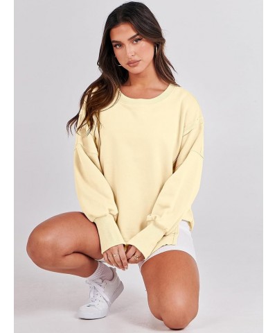 Women's Oversized Sweatshirt Crew Neck Long Sleeve Casual Slit Sloucthy Pullover Top Fall Clothes Cream Yellow $17.57 Hoodies...