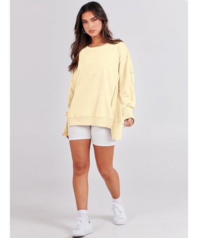 Women's Oversized Sweatshirt Crew Neck Long Sleeve Casual Slit Sloucthy Pullover Top Fall Clothes Cream Yellow $17.57 Hoodies...